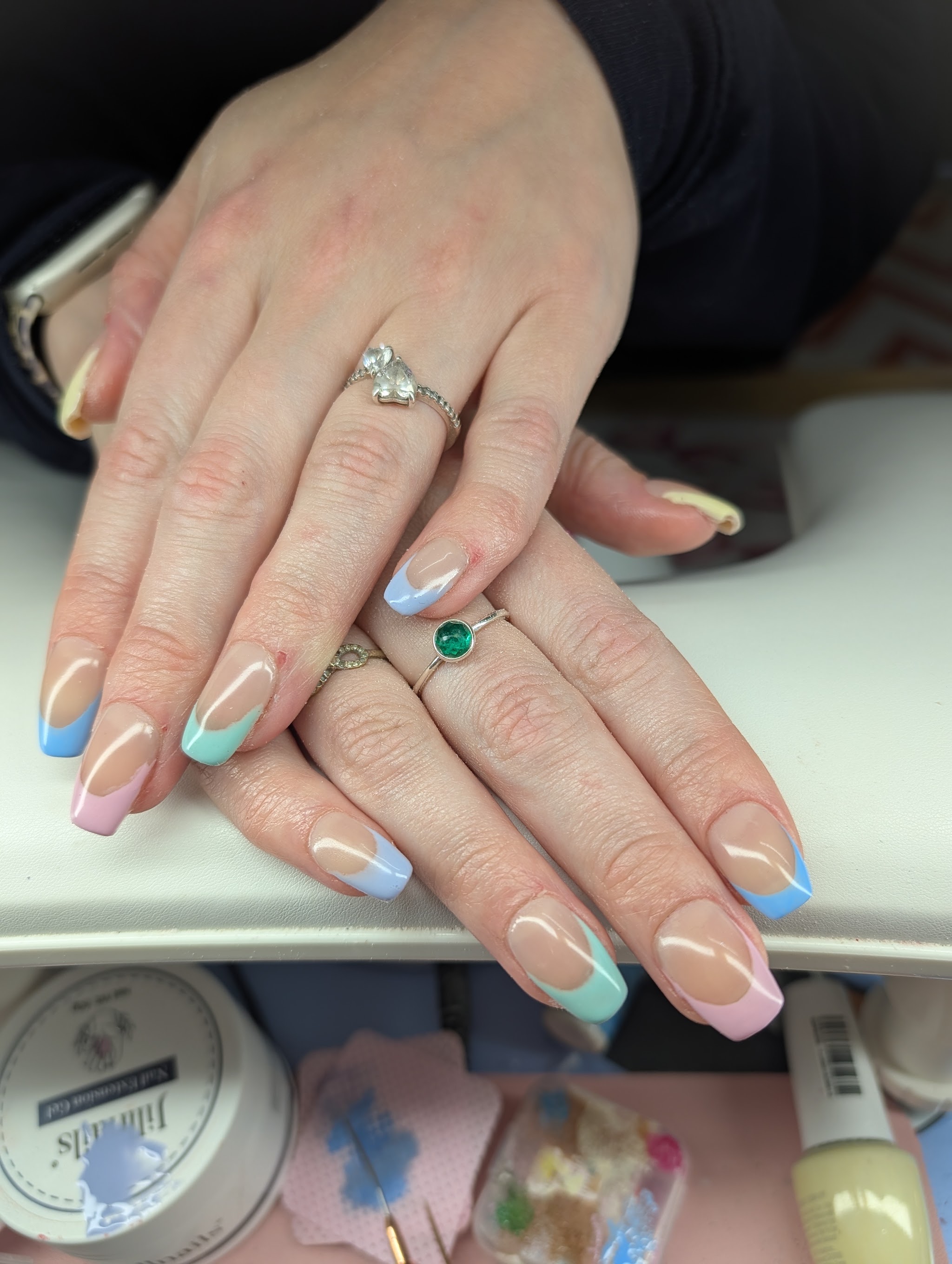 Almond nails with pastel rainbow French tips